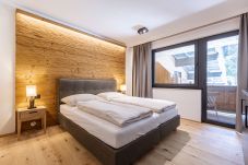 Aparthotel in Saalbach - Suite met 3 slaapkamers & wellnessruimte