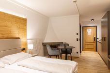 Aparthotel in Saalbach - Juniorsuite voor 2 personen & wellnessruimte