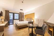 Aparthotel in Saalbach - Juniorsuite voor 2 personen & wellnessruimte