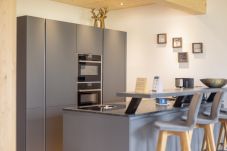 Ferienwohnung in Haus im Ennstal - Premium Ferienwohnung mit Galerie, Sauna & Außenbadewanne