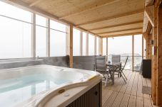 Ferienwohnung in Haus im Ennstal - Premium Ferienwohnung mit Sauna & Whirlpool