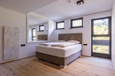 Aparthotel in Saalbach - Suite mit 2 Schlafzimmern, IR-Sauna & Wellnessbereich