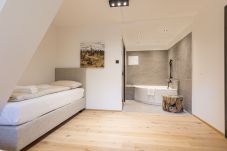 Aparthotel in Saalbach - Suite mit 2 Schlafzimmern, IR-Sauna & Wellnessbereich